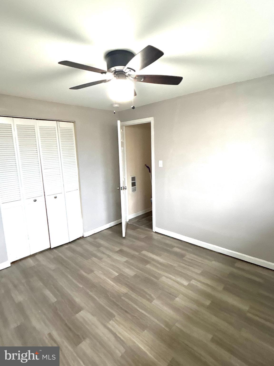 6 Storeys Court Baltimore, MD 21236 - Photo 18 of 27 an empty room with fan and entrance