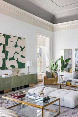 a view of a balcony with chairs