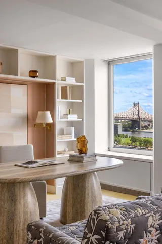 a living room with furniture and window