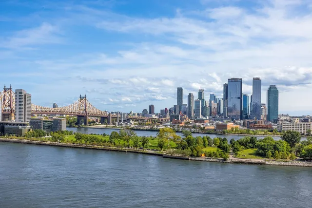 a view of a city with tall buildings