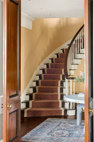 a view of swimming pool with furniture