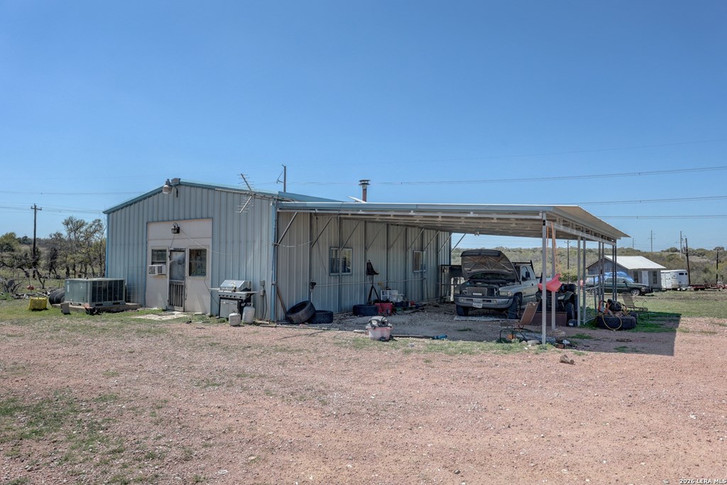 1443 Gina Road Harper, TX 78631 - Photo 23 of 49 a view of a house with patio