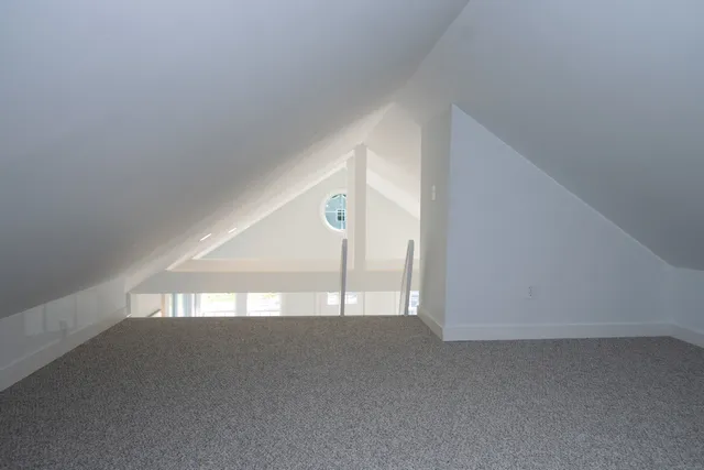 a workspace with furniture and window