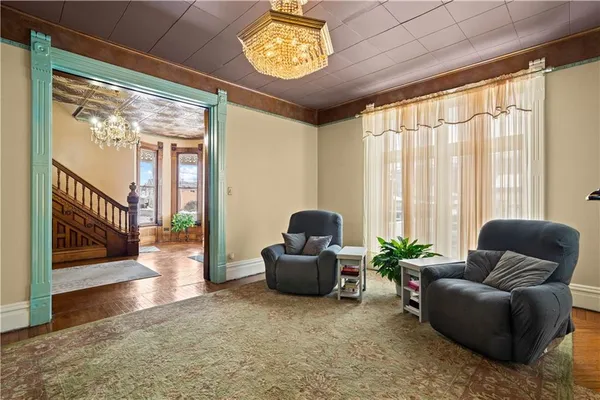 a living room with furniture and a window