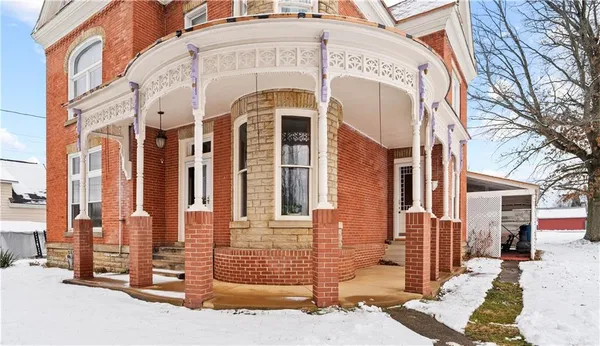 a front view of a building with glass windows
