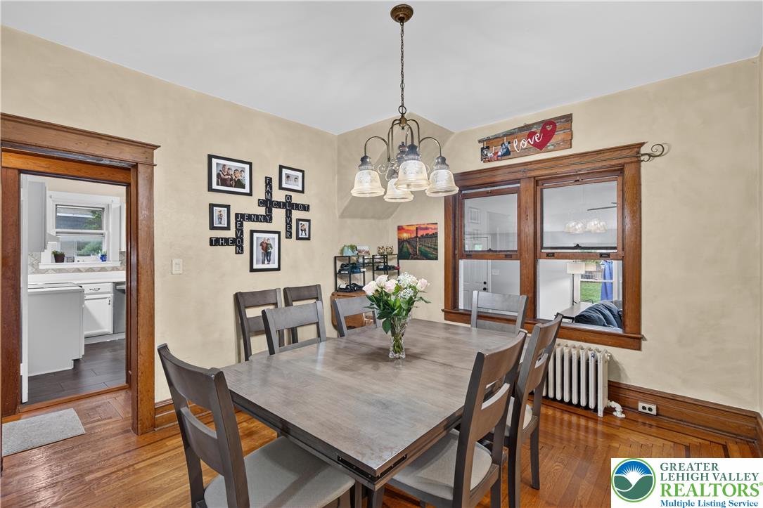 534 Ridge Street Emmaus, PA 18049 - Photo 15 of 40 a view of a dining room with furniture wooden floor and a chandelier