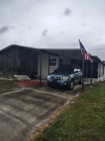 a view of car parked in front of house
