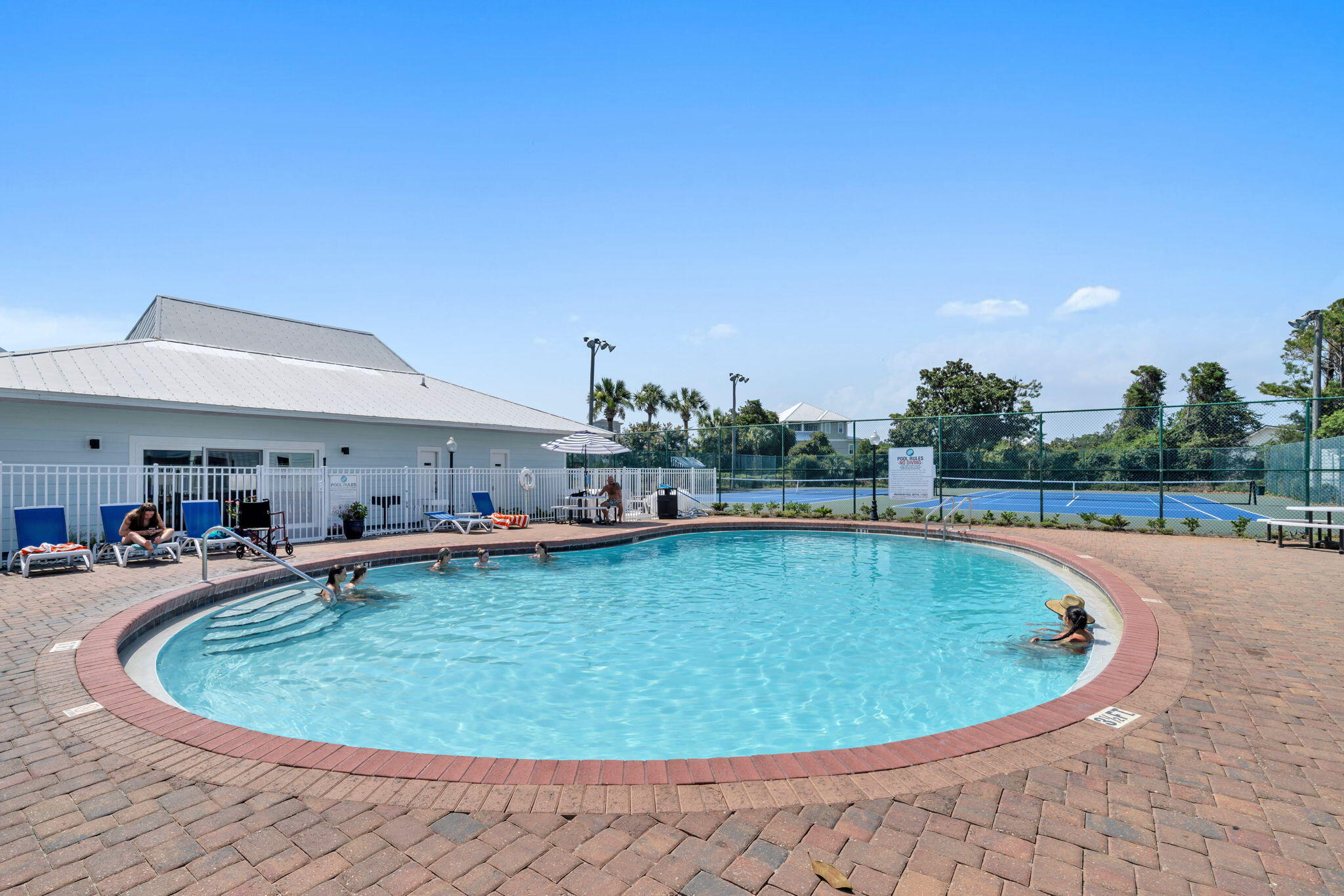 11 Beachside Drive, Unit 131 Santa Rosa Beach, FL 32459 - Photo 14 of 25 a view of a swimming pool with outdoor seating