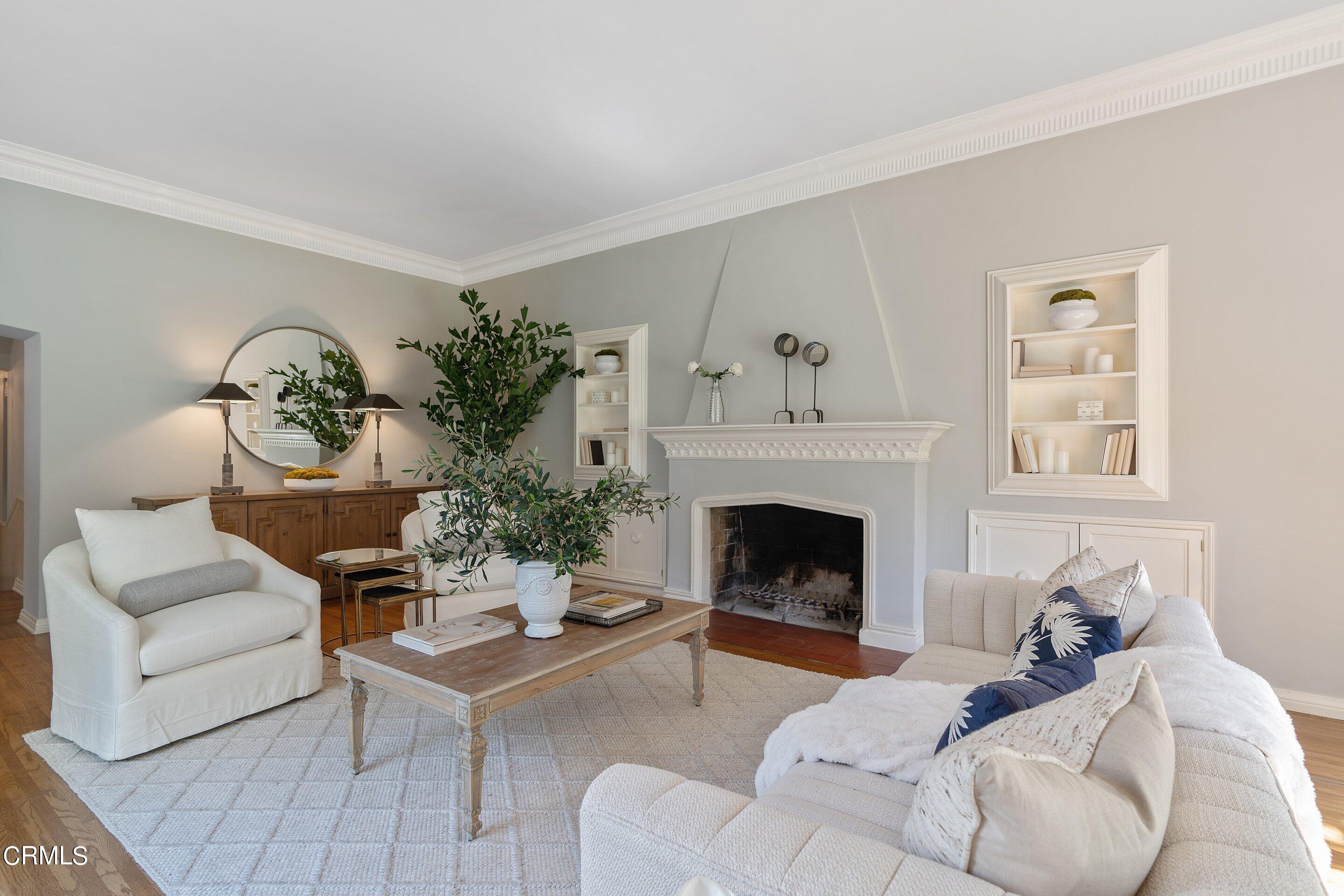 1637 Valley View Road Glendale, CA 91202 - Photo 13 of 66 a living room with furniture and a fireplace