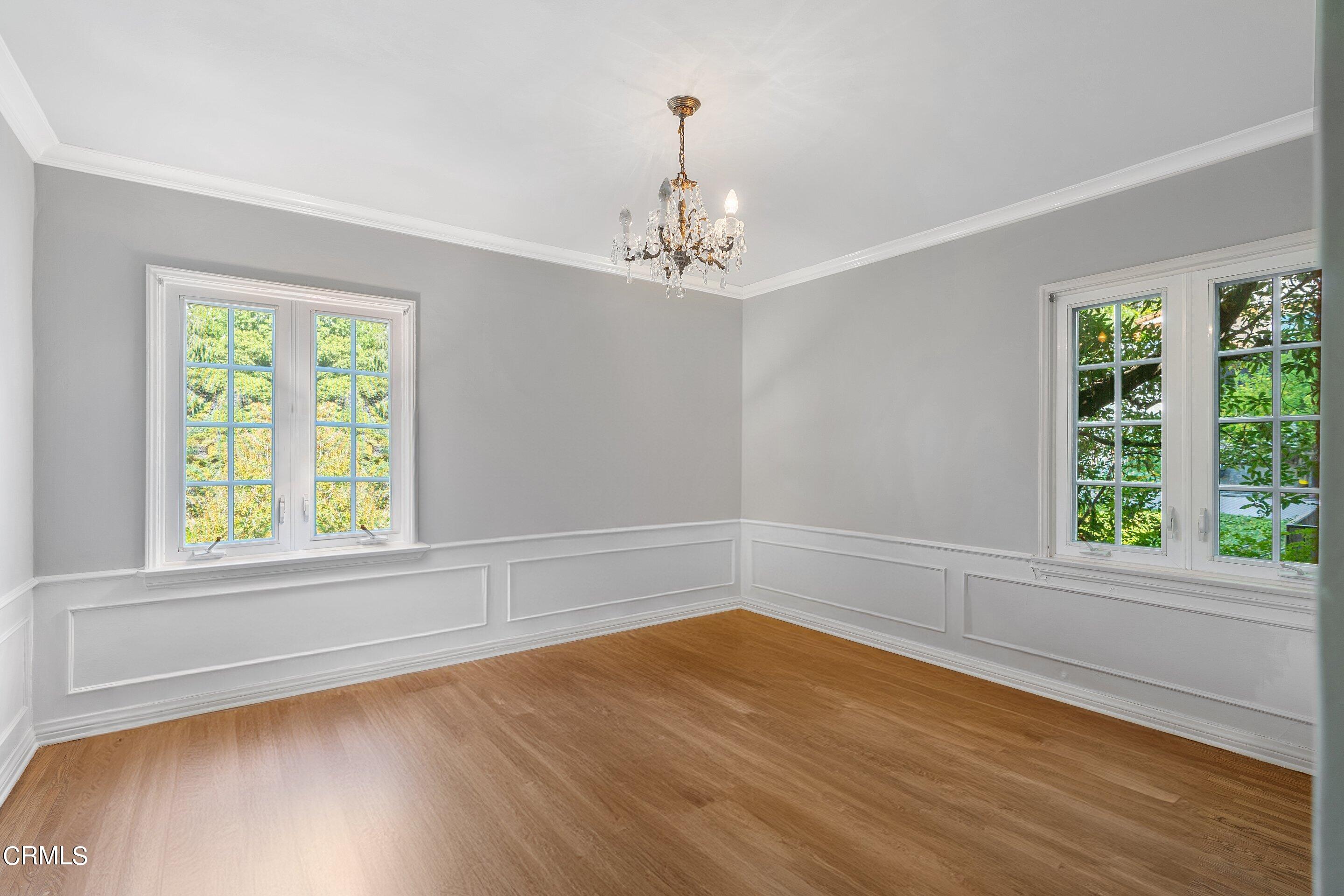1637 Valley View Road Glendale, CA 91202 - Photo 33 of 66 wooden floor in an empty room with a window