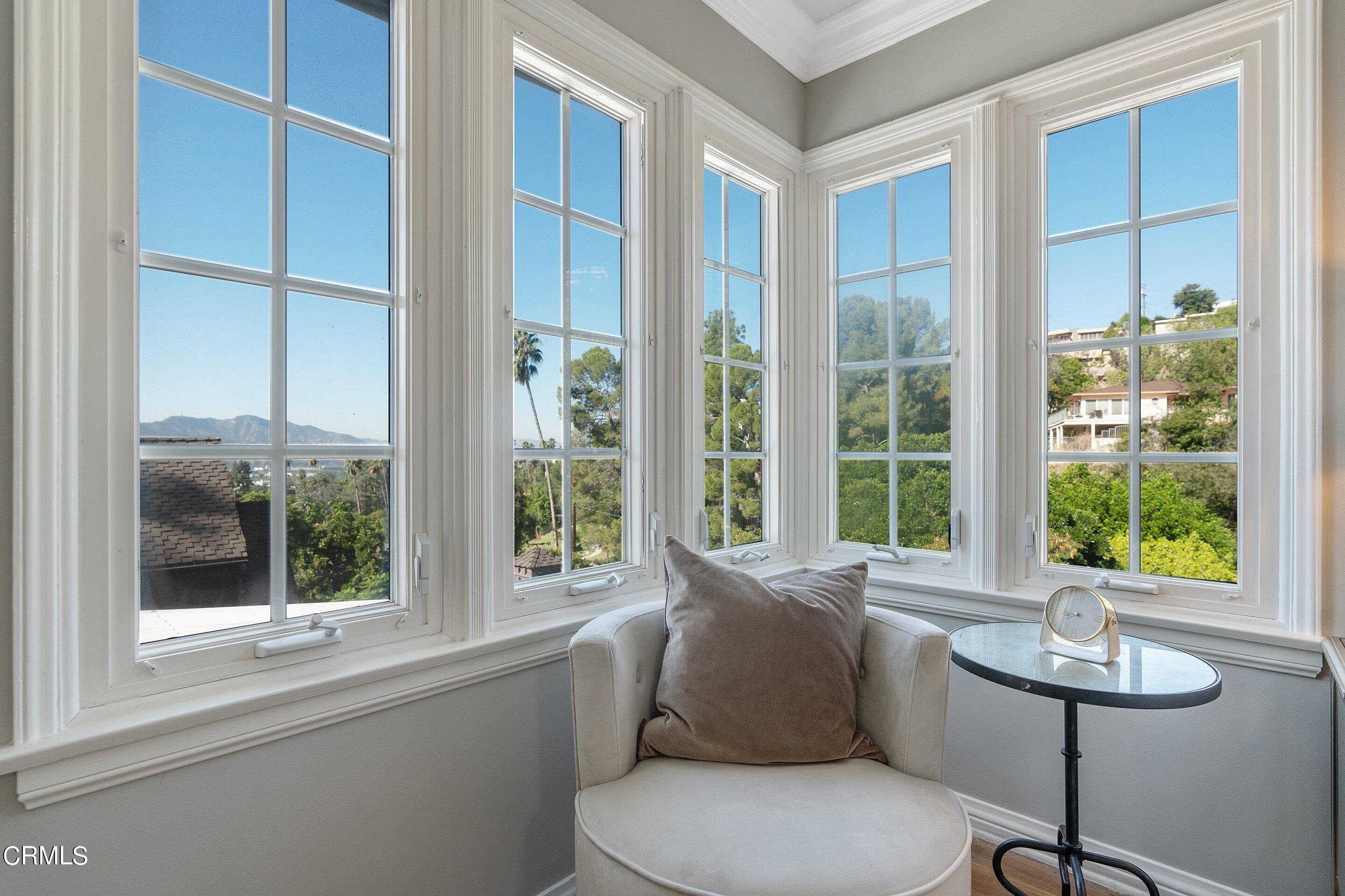 1637 Valley View Road Glendale, CA 91202 - Photo 37 of 66 a living room with furniture and a window