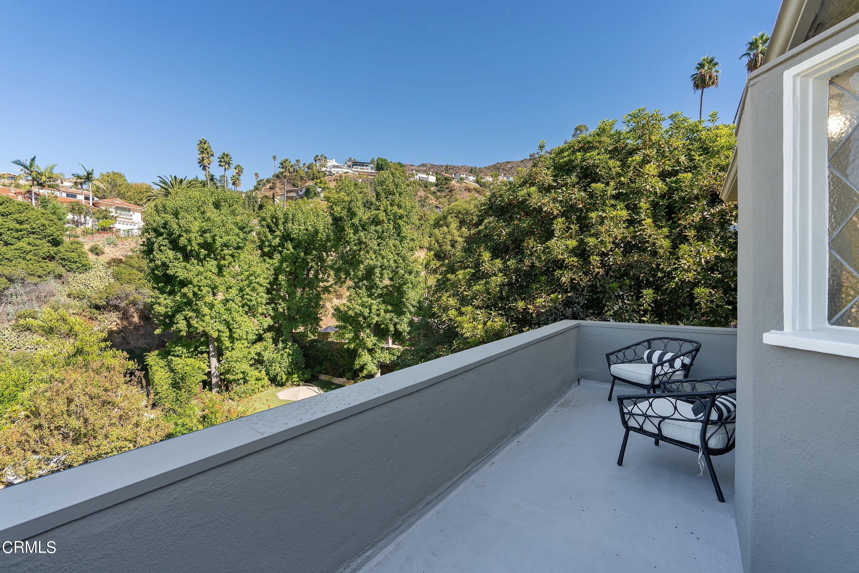 1637 Valley View Road Glendale, CA 91202 - Photo 42 of 66 a view of a bench in a balcony
