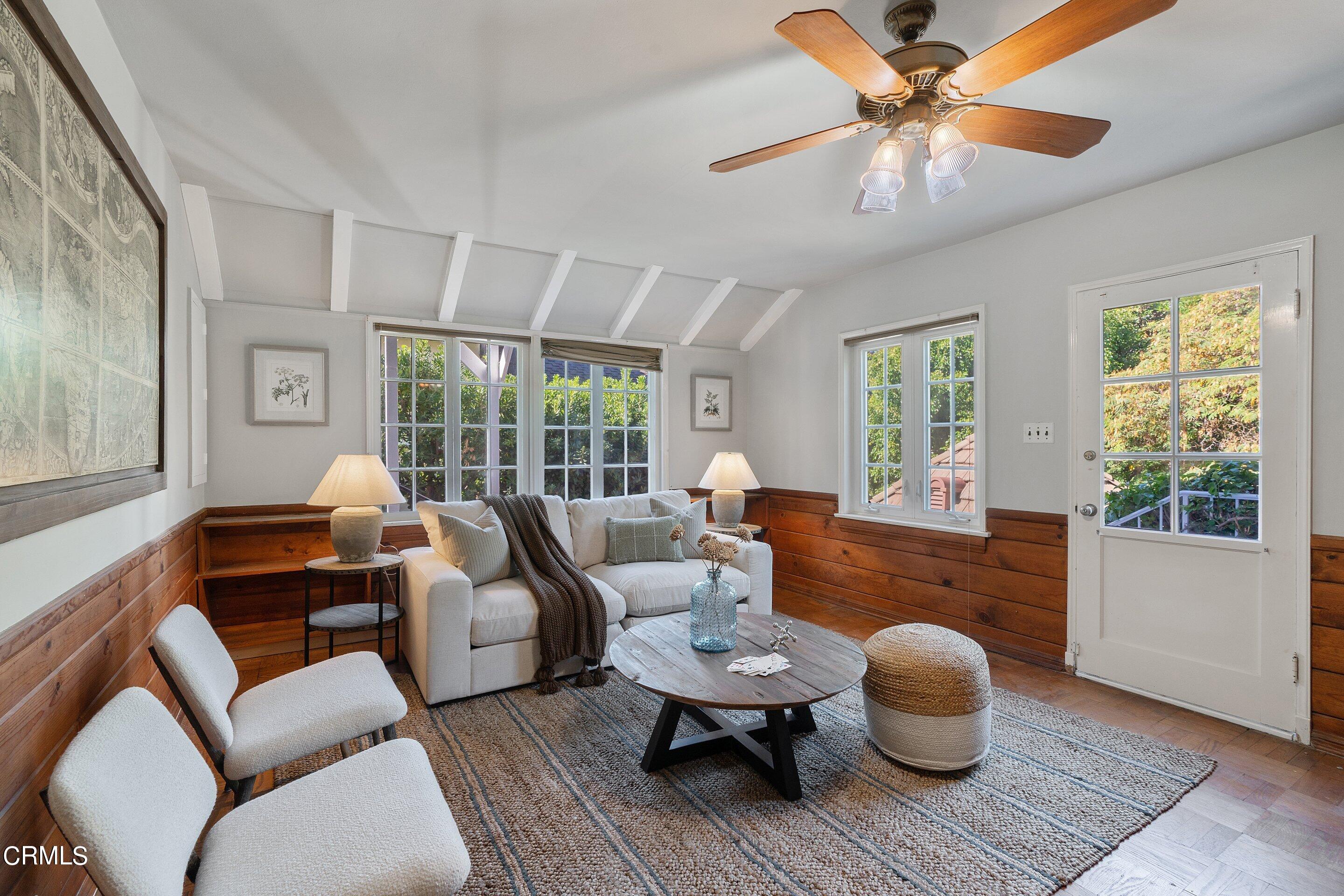 1637 Valley View Road Glendale, CA 91202 - Photo 52 of 66 a living room with furniture and a large window