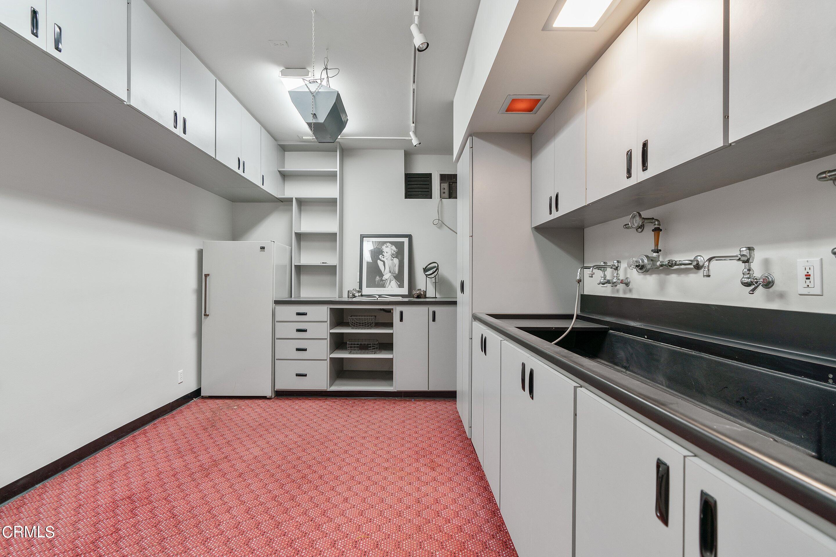 1637 Valley View Road Glendale, CA 91202 - Photo 56 of 66 a kitchen with stainless steel appliances a stove and a refrigerator