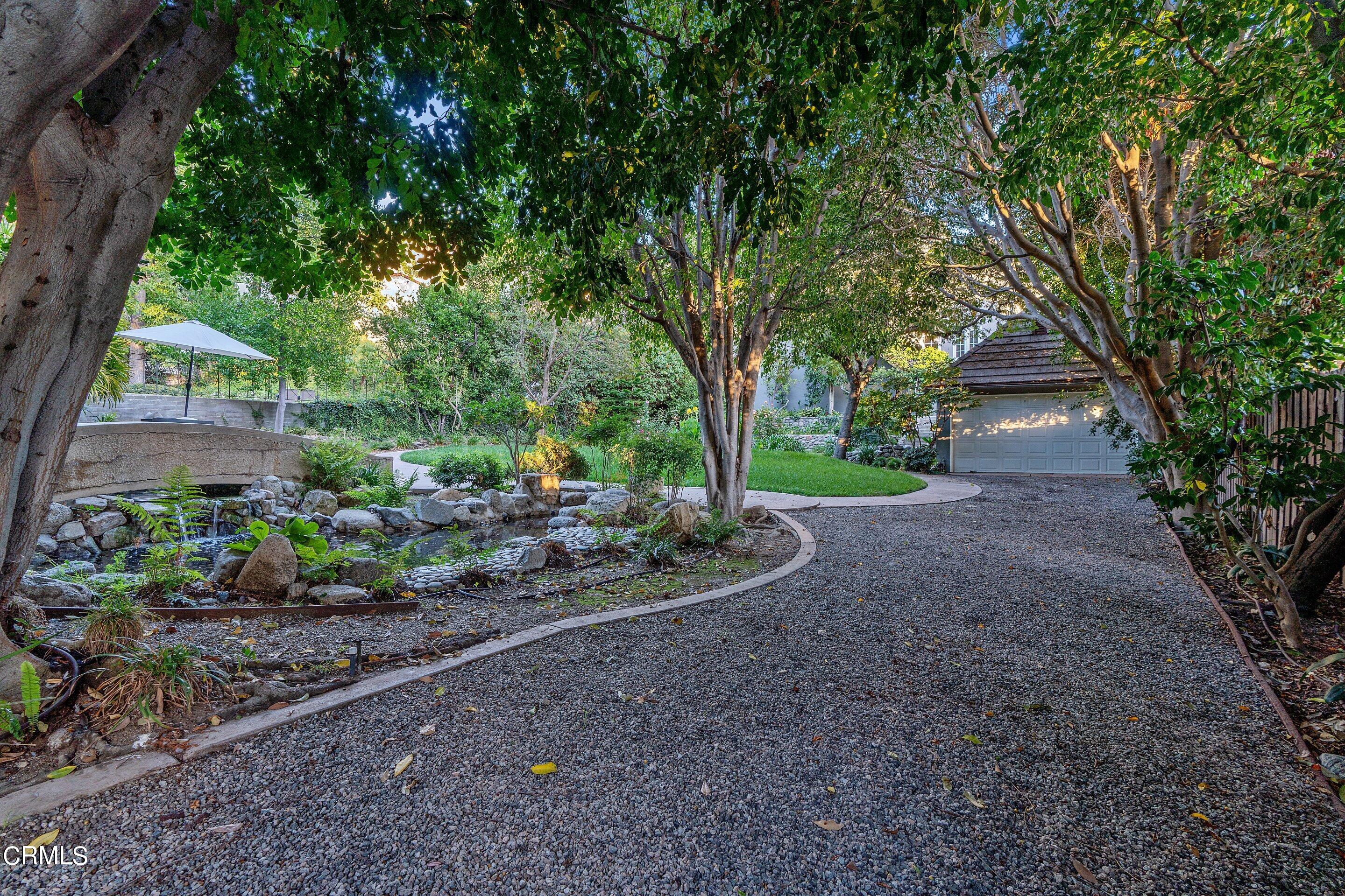 1637 Valley View Road Glendale, CA 91202 - Photo 66 of 66 a view of a house with yard and a garden