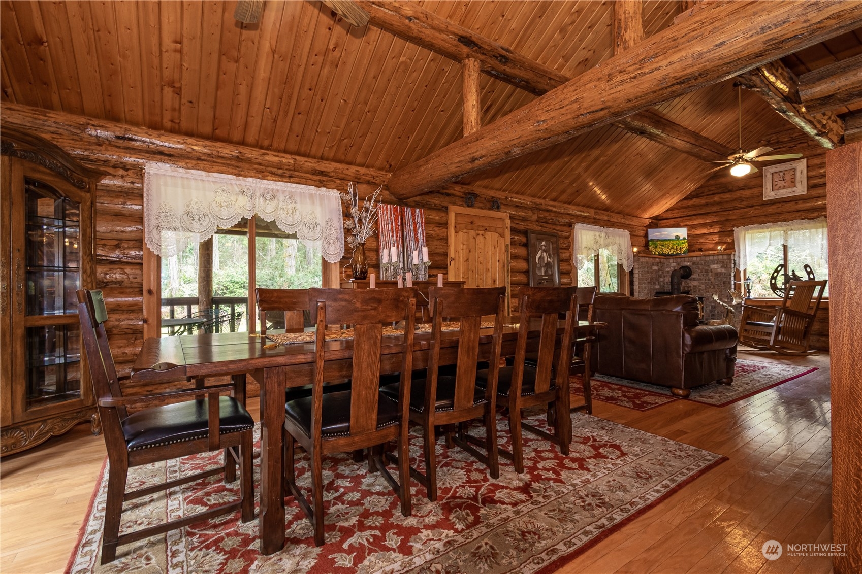 8526 Davenport Road Anderson Island, WA 98303 - Photo 12 of 31 a large room with lots of wooden furniture