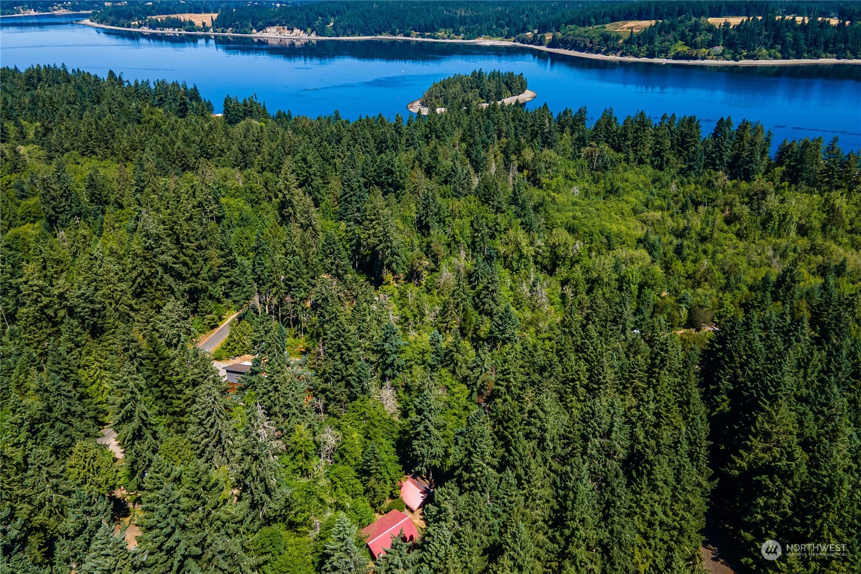 8526 Davenport Road Anderson Island, WA 98303 - Photo 30 of 31 a view of a lake with a city