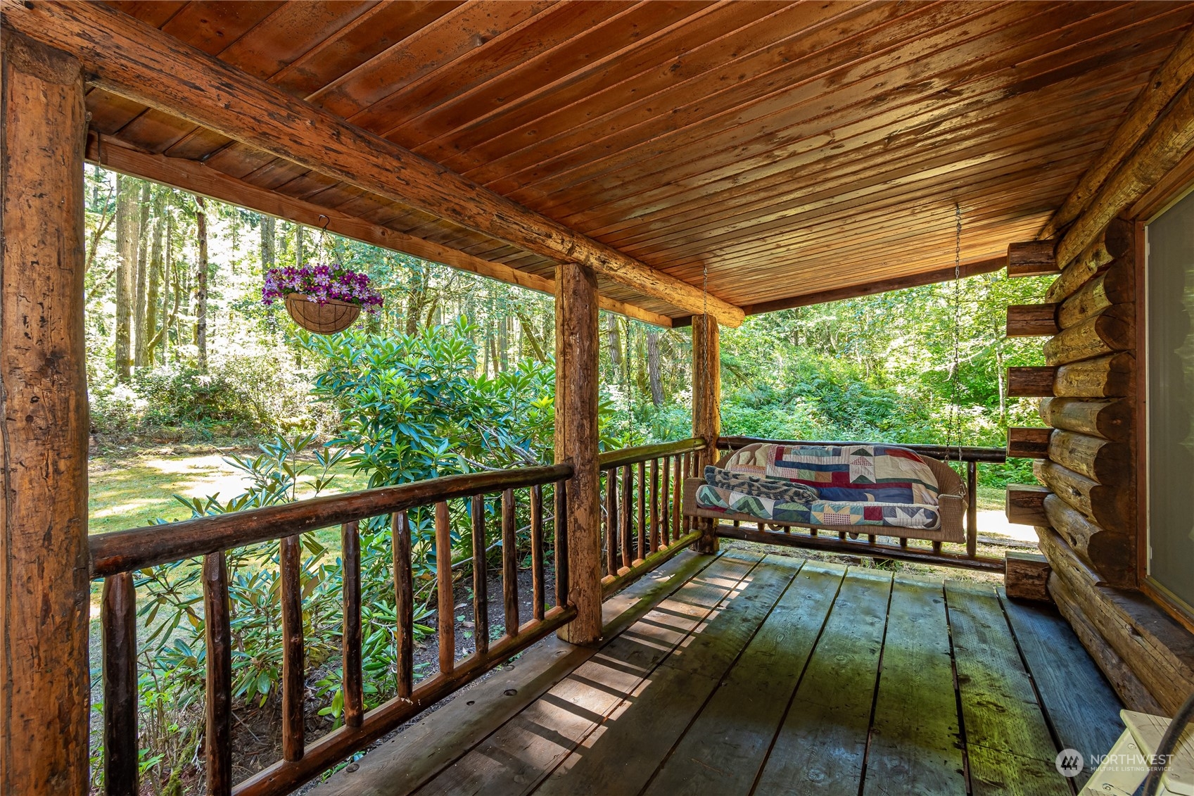 8526 Davenport Road Anderson Island, WA 98303 - Photo 7 of 31 a view of balcony with wooden floor