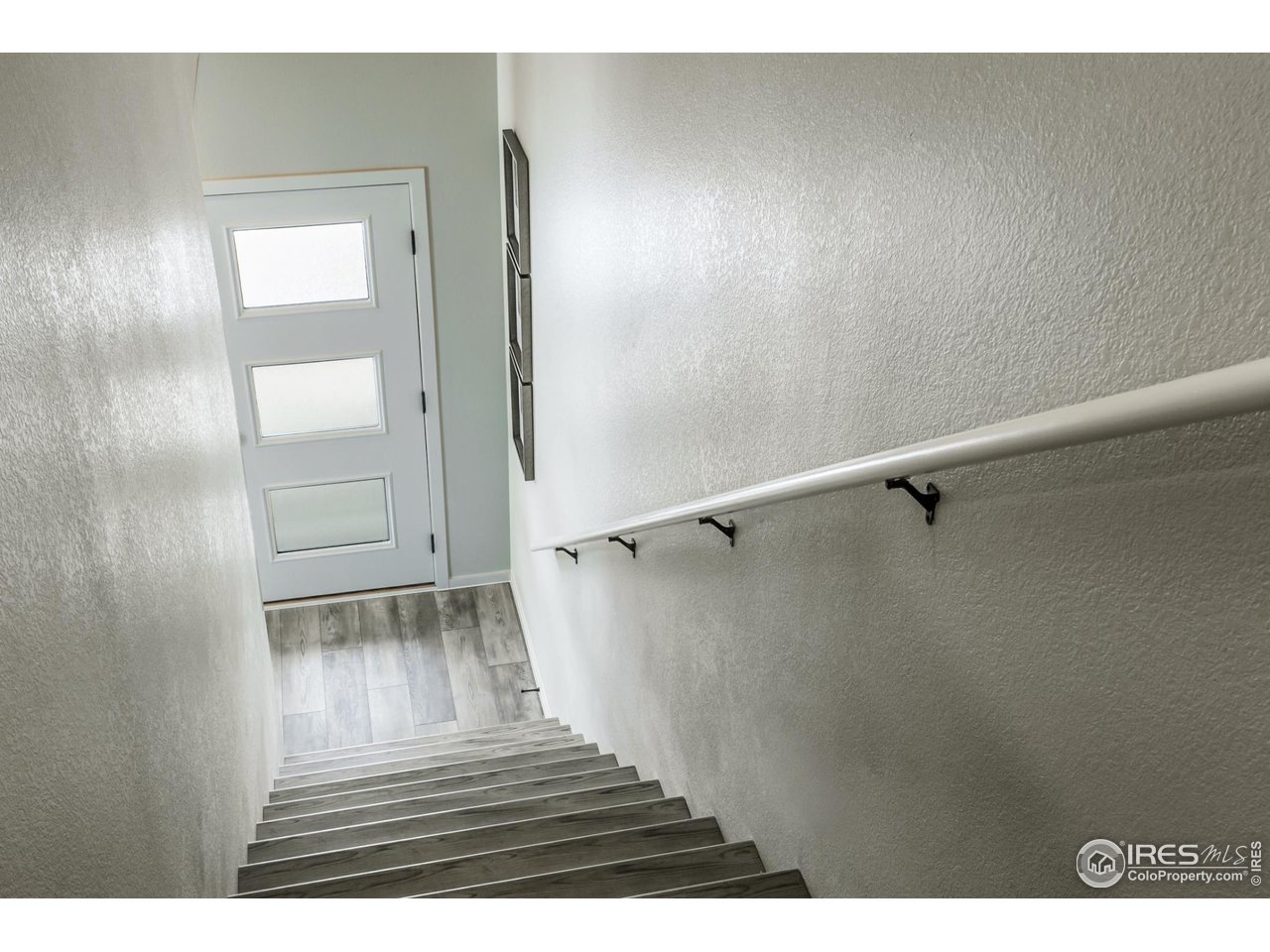 6719 4th St Road, Unit 1 Greeley, CO 80634 - Photo 20 of 34 EXAMPLE PHOTO: STAIRWAY