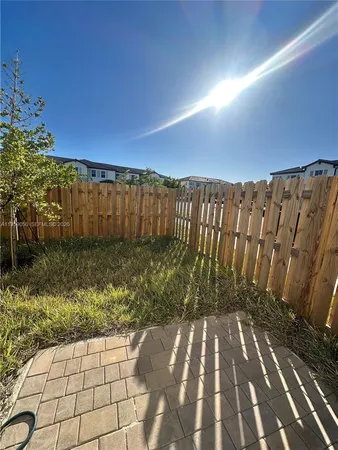 a view of balcony with wooden floor