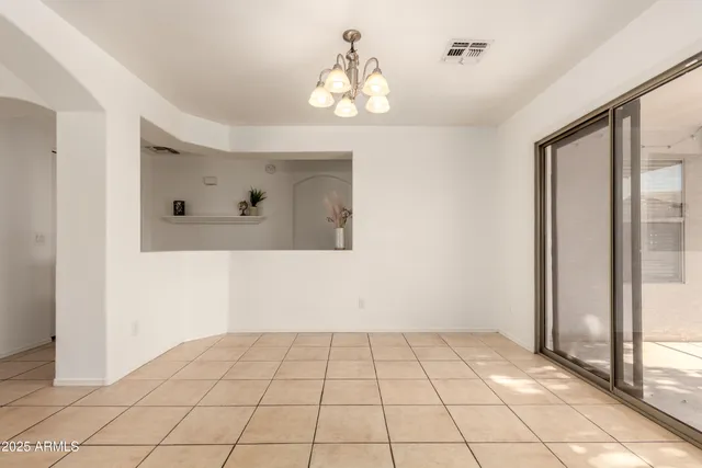 a kitchen with a refrigerator stove and microwave