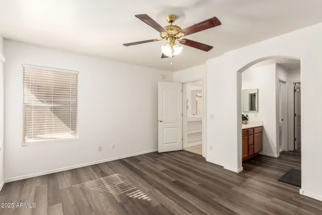 a bathroom with a double vanity sink and mirror