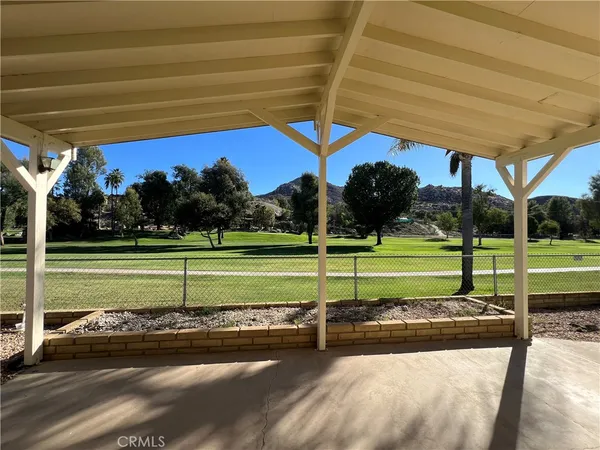 a view of a park with a slide