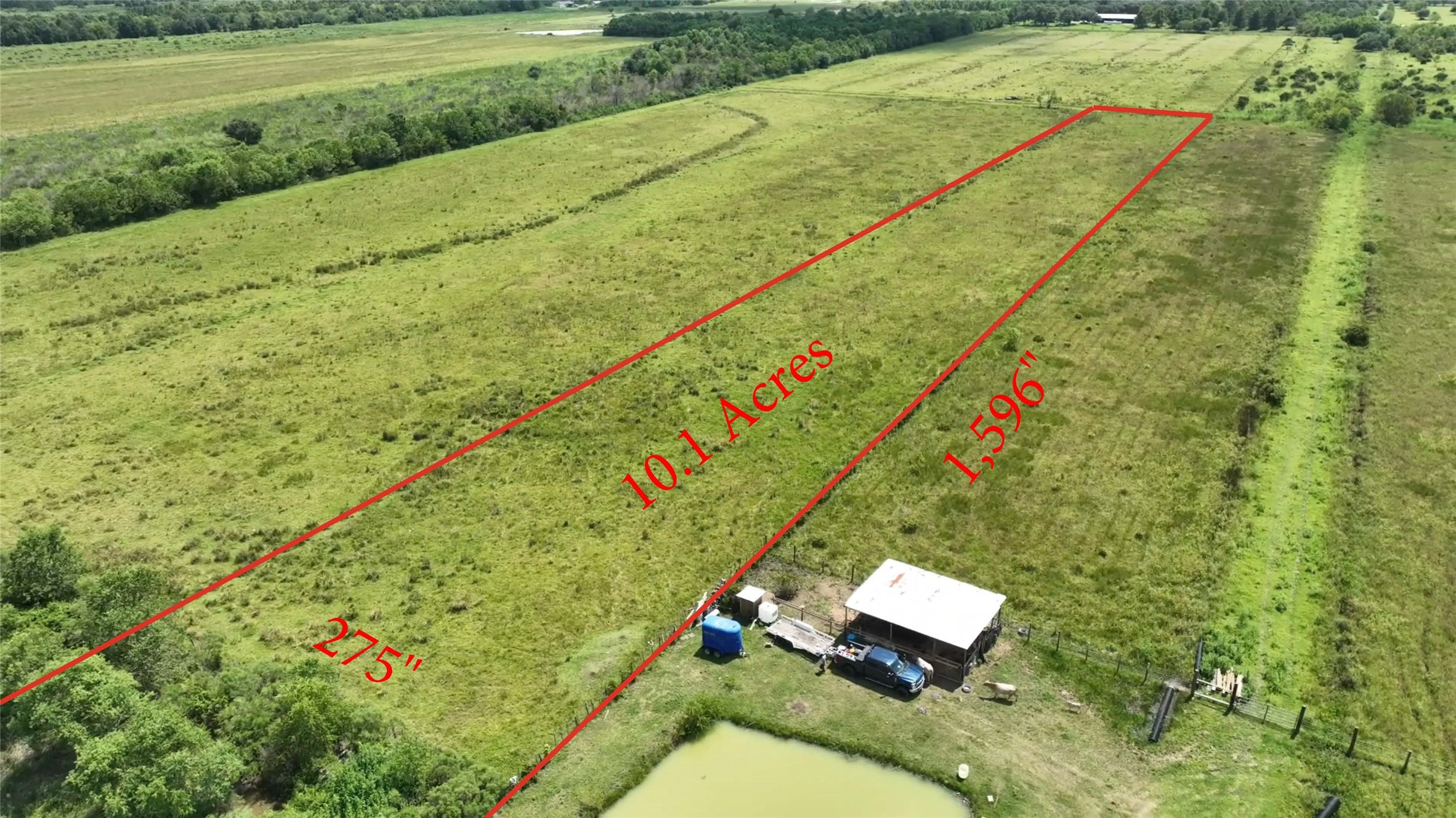 710 Heller Road Anahuac, TX 77514 - Photo 2 of 8 a view of an outdoor space and a lake view