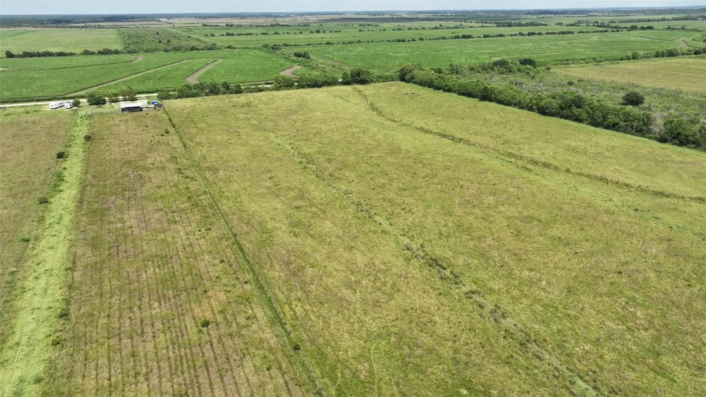 710 Heller Road Anahuac, TX 77514 - Photo 4 of 8 a view of a big yard