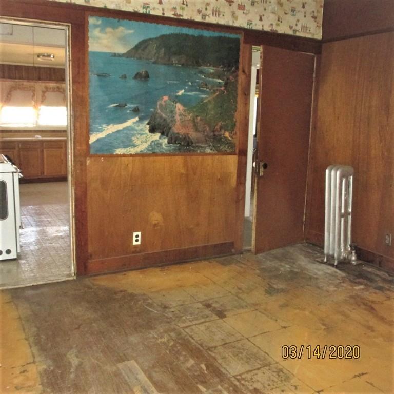 48 Nichols Street Everett, MA 02149 - Photo 3 of 18 a view of backyard with wooden floor