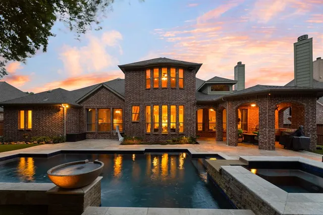 a view of swimming pool with outdoor seating