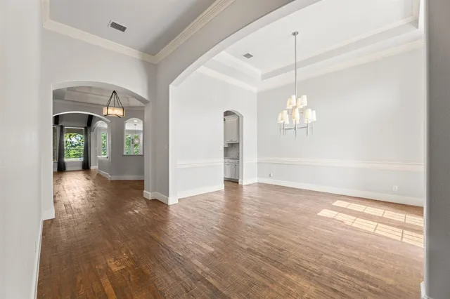 a view of a livingroom with wooden floor