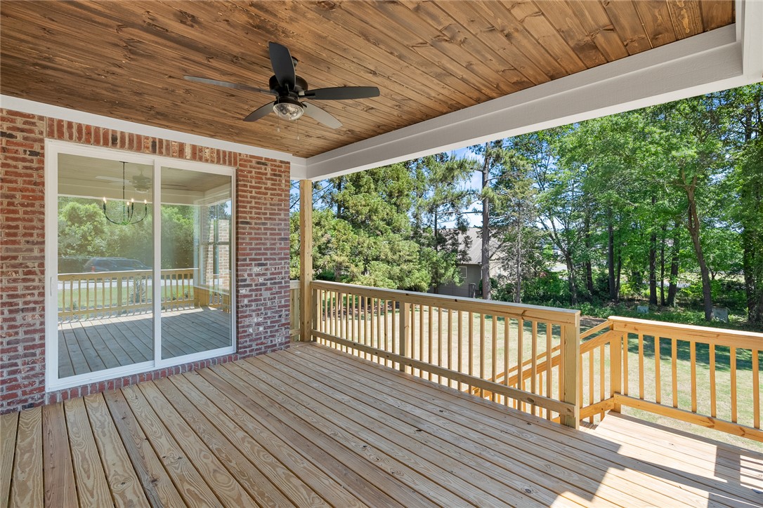 100 Garden Gate Drive Anderson, SC 29621 - Photo 37 of 43 This outdoor deck provides a serene extension of living space, ideal for relaxation and entertaining.