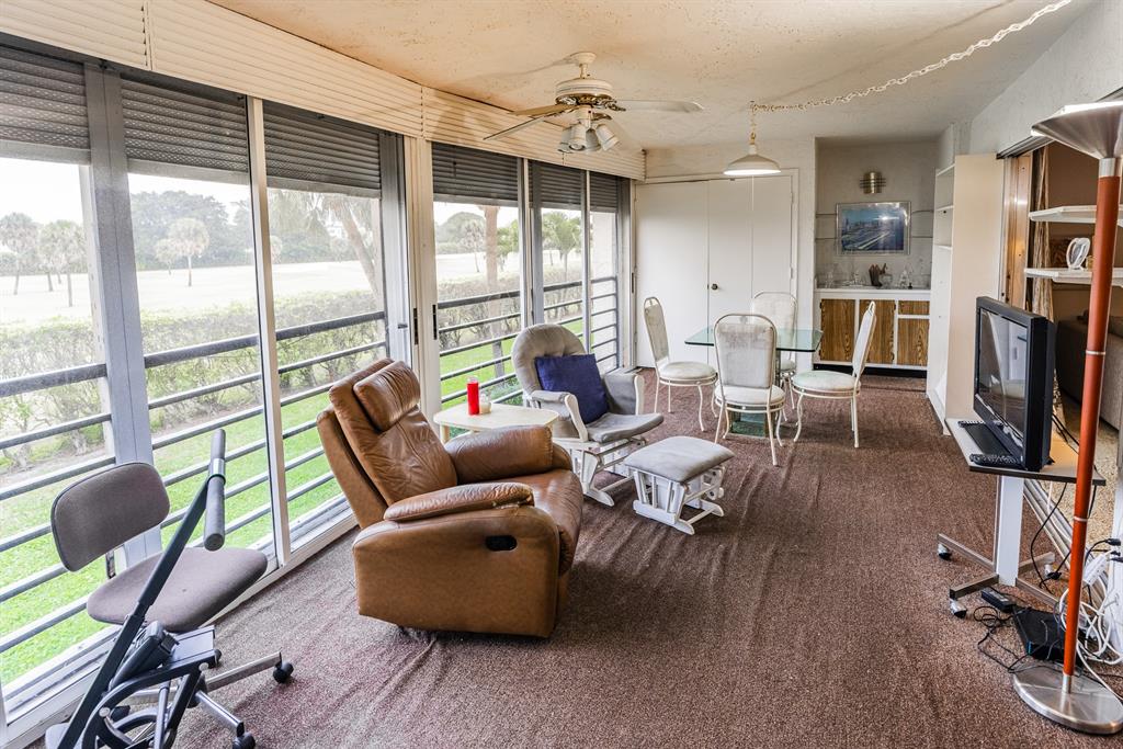 9165 Southwest 14th Street, Unit 1204 Boca Raton, FL 33428 - Photo 15 of 30 Screened balcony with glass sliders