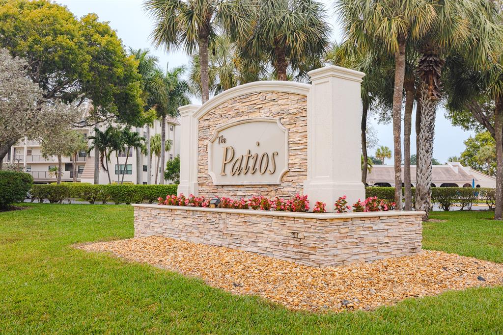 9165 Southwest 14th Street, Unit 1204 Boca Raton, FL 33428 - Photo 2 of 30 The Patios entrance