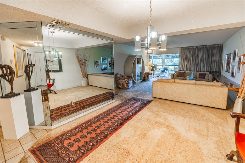 9165 Southwest 14th Street, Unit 1204 Boca Raton, FL 33428 - Photo 22 of 30 Dining room looking to family room