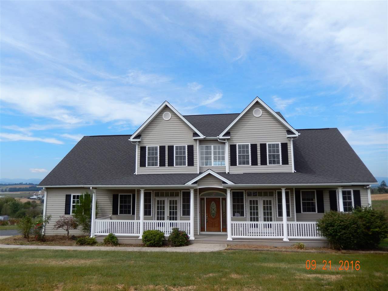 2437 Fadley Road Bridgewater, VA 22812 - Photo 22 of 22 a front view of a house with garden