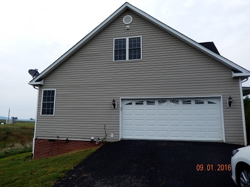 2437 Fadley Road Bridgewater, VA 22812 - Photo 3 of 22 a front view of a house with a yard