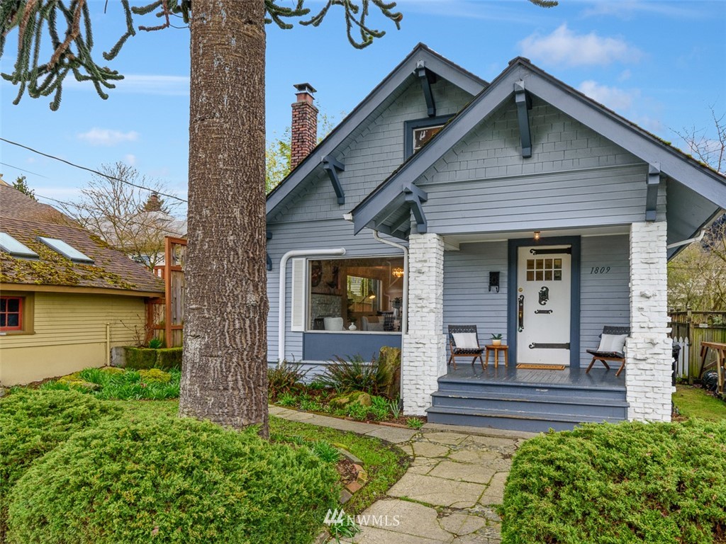 1809 North 41st Street Seattle, WA 98103 - Photo 1 of 32 a front view of a house with garden