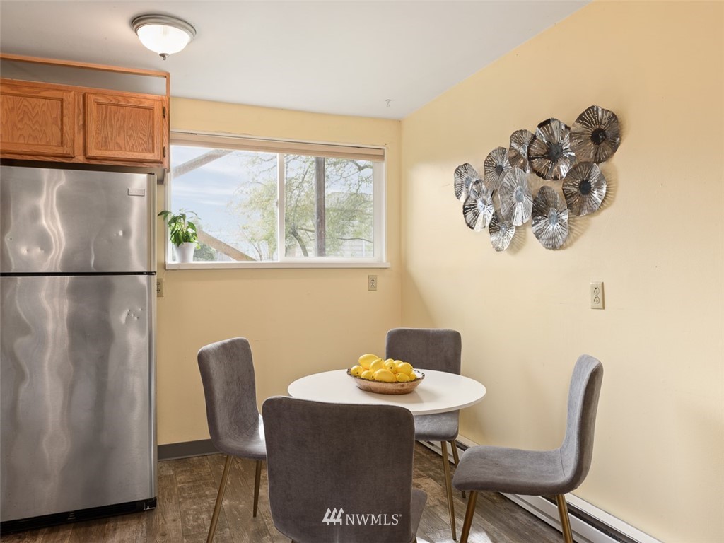 1809 North 41st Street Seattle, WA 98103 - Photo 13 of 32 a view of a dining room with furniture window and outside view