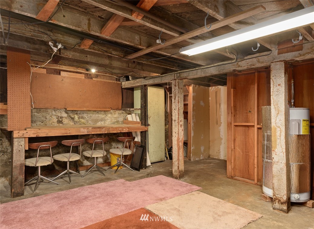 1809 North 41st Street Seattle, WA 98103 - Photo 31 of 32 a view of an empty room with wooden walls
