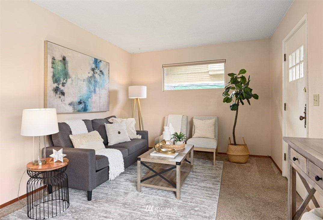 1809 North 41st Street Seattle, WA 98103 - Photo 5 of 32 a living room with furniture and a lamp