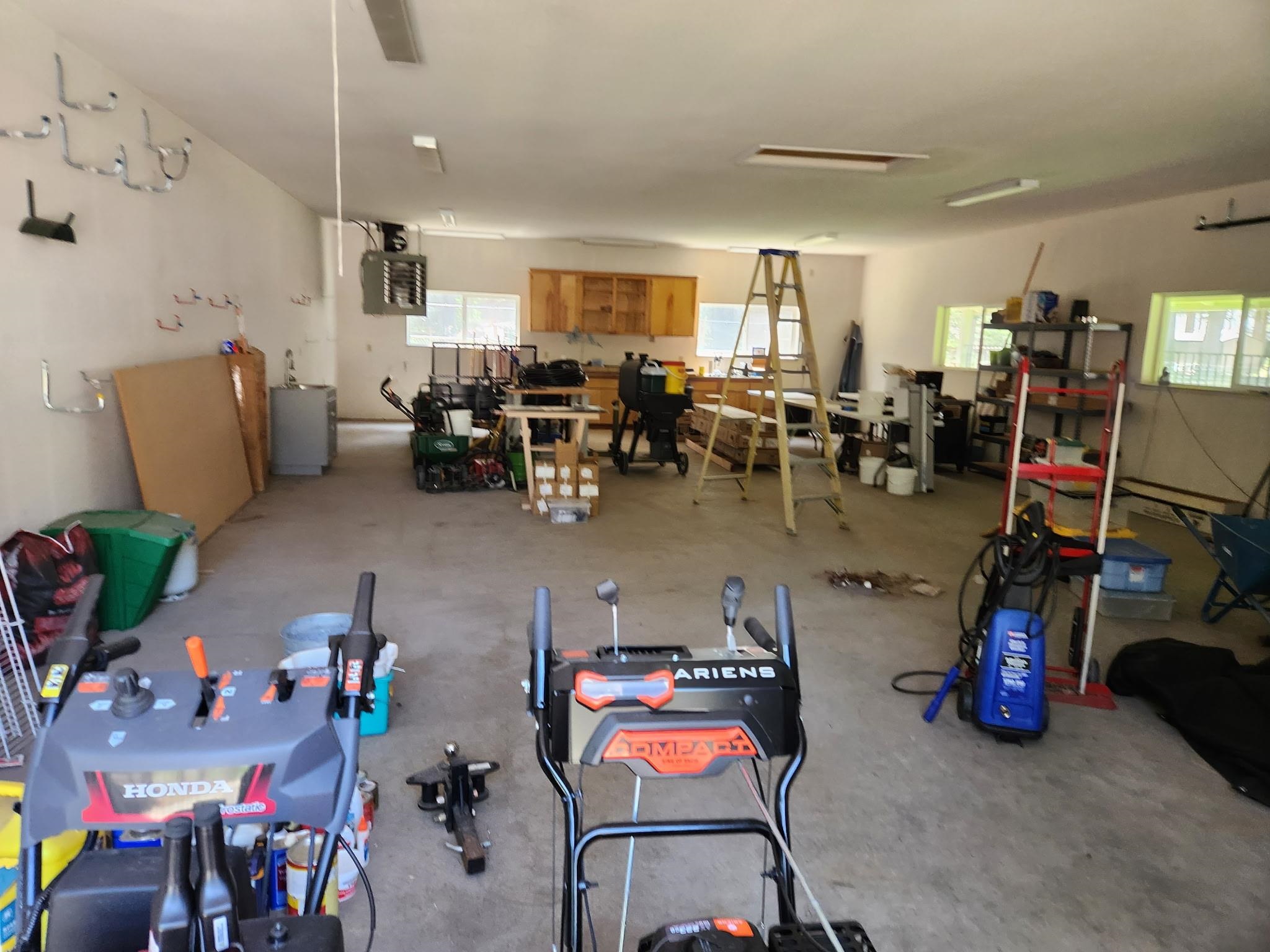 650 Wagon Road Chester, CA 96020 - Photo 26 of 36 a living room with lots of furniture and clutter