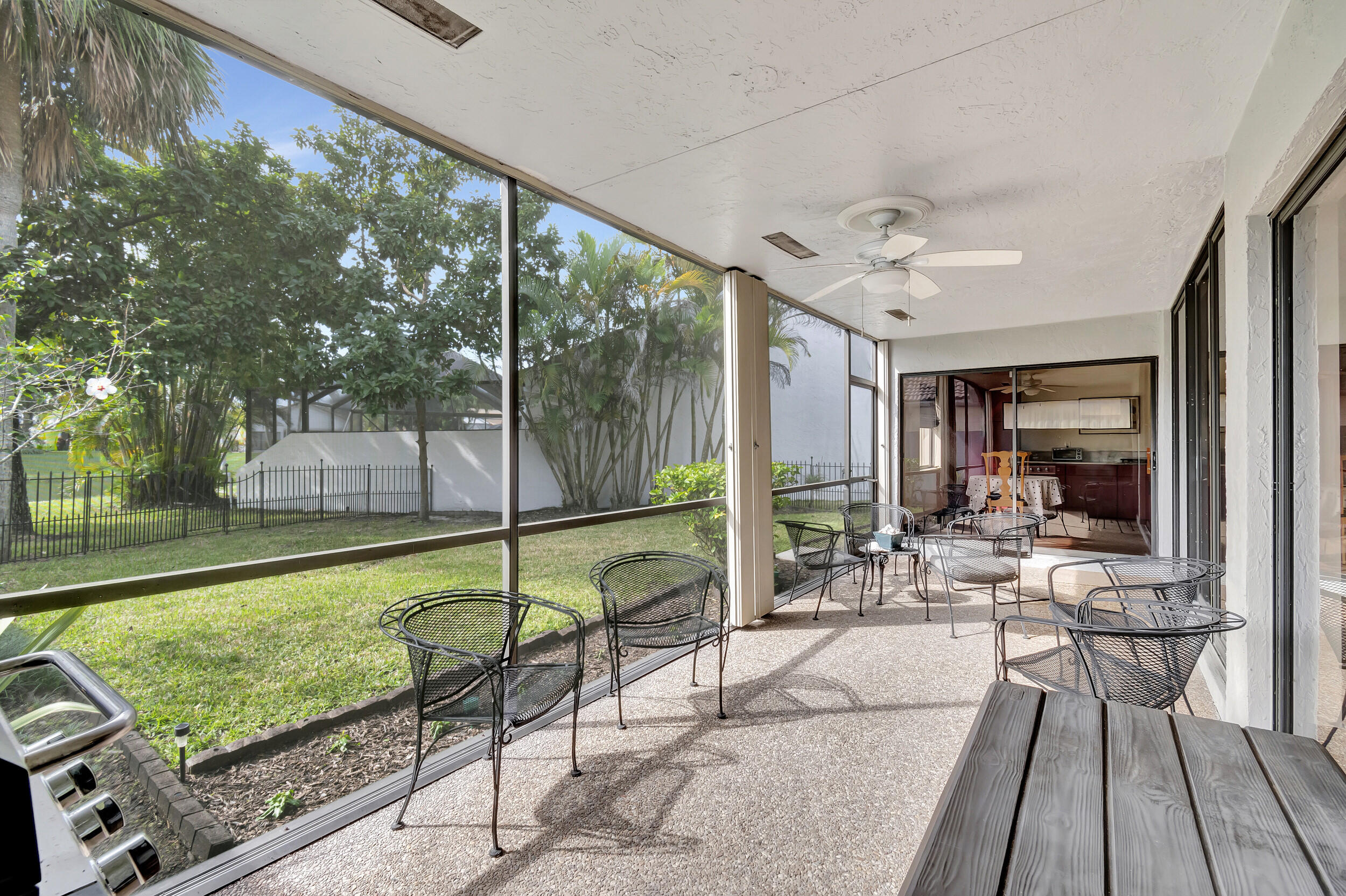 11104 Highland Circle Boca Raton, FL 33428 - Photo 19 of 79 PATIO ALONG LIVING AREA AND MASTER