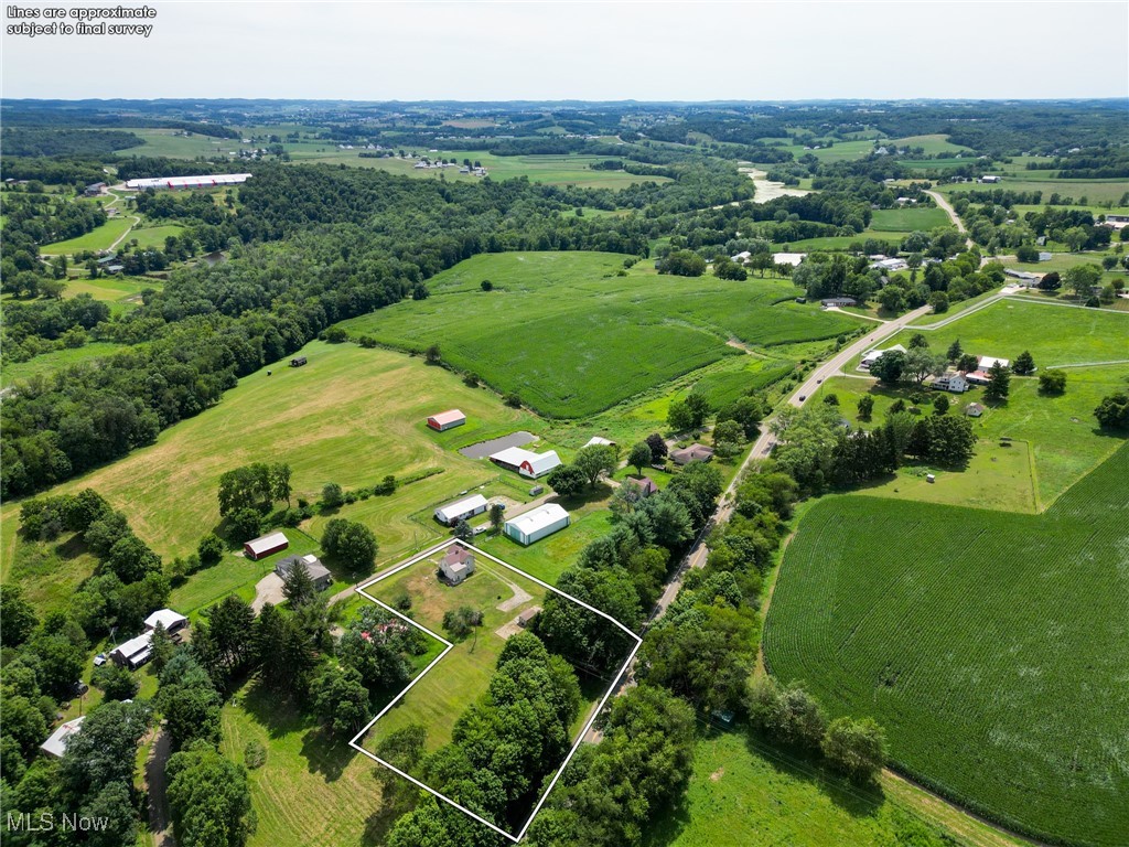 6596 Mill Road Northwest Dundee, OH 44624 - Photo 4 of 18 Overview of rural landscape with property boundaries highlighted and agricultural land