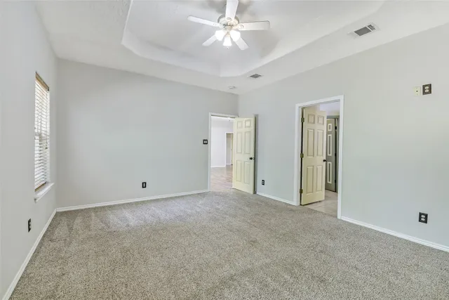 a bathroom with a tub and a shower