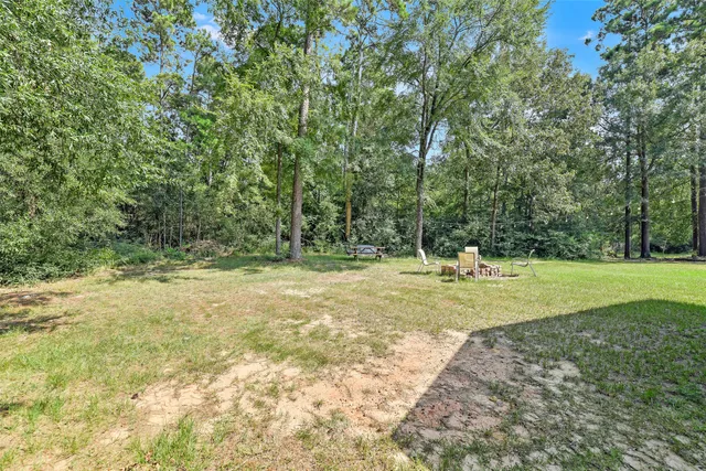 a house view with a garden space