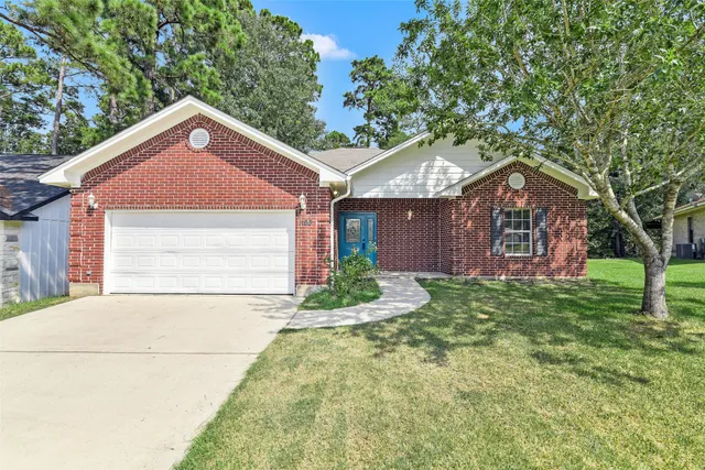 a view of a kitchen from the hallway