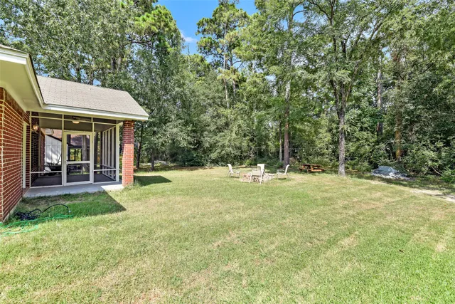 an aerial view of a house having yard