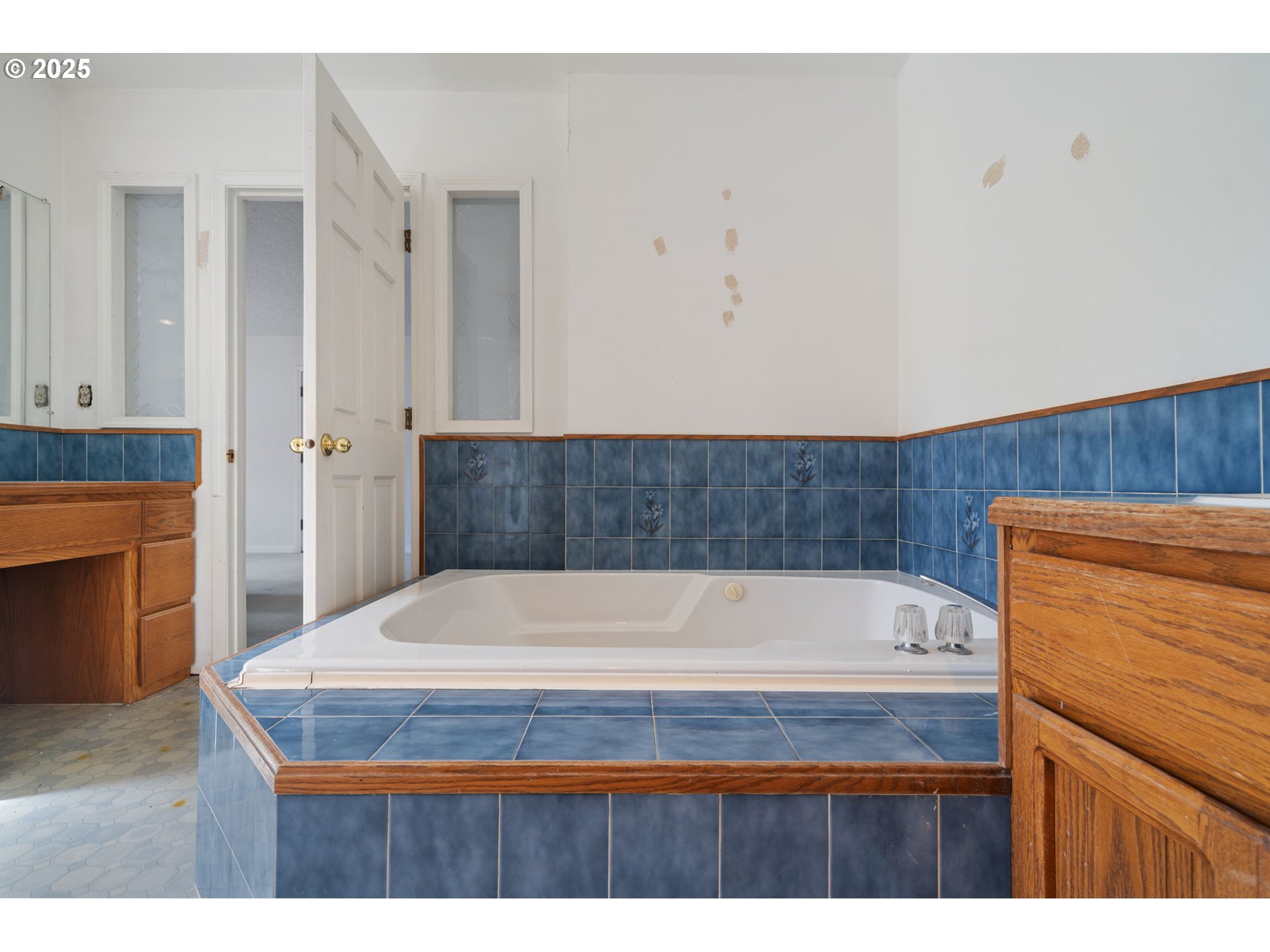 3411 Northeast 179th Street Ridgefield, WA 98642 - Photo 35 of 48 a bathroom with a bathtub and a sink
